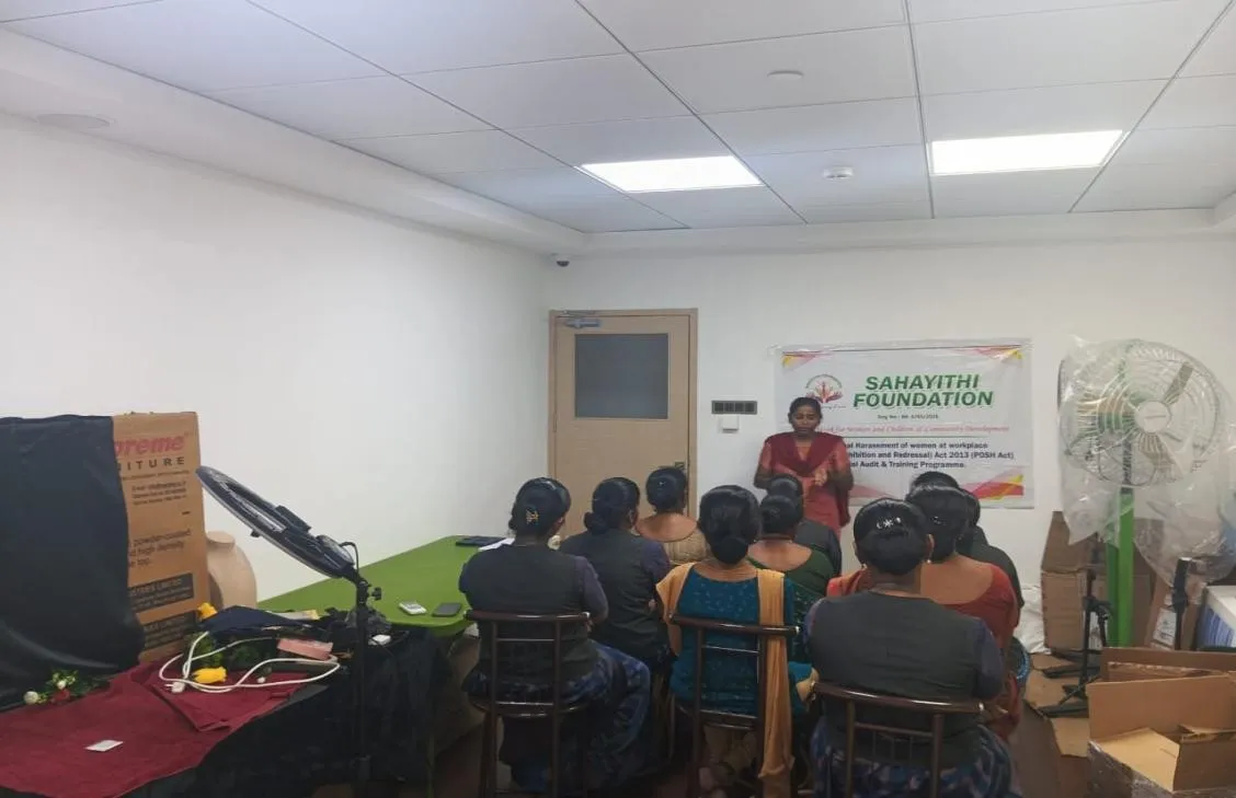 Women employees participating in workplace safety awareness at Sri Thenu Silks, Avinashi